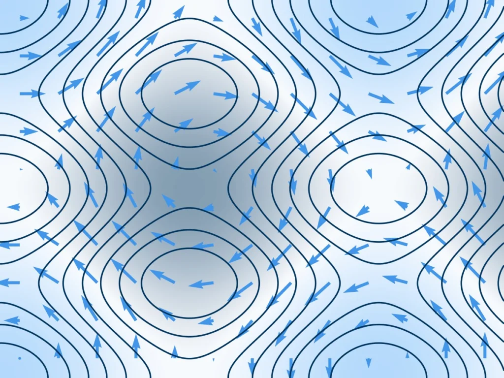 Light blue arrows showing a flow and dark blue magnetic field lines in closed loops, on a pale blue background